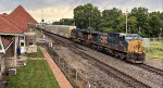 CSX 69 pulls across the C&O and past the depot with the first cut of cars.